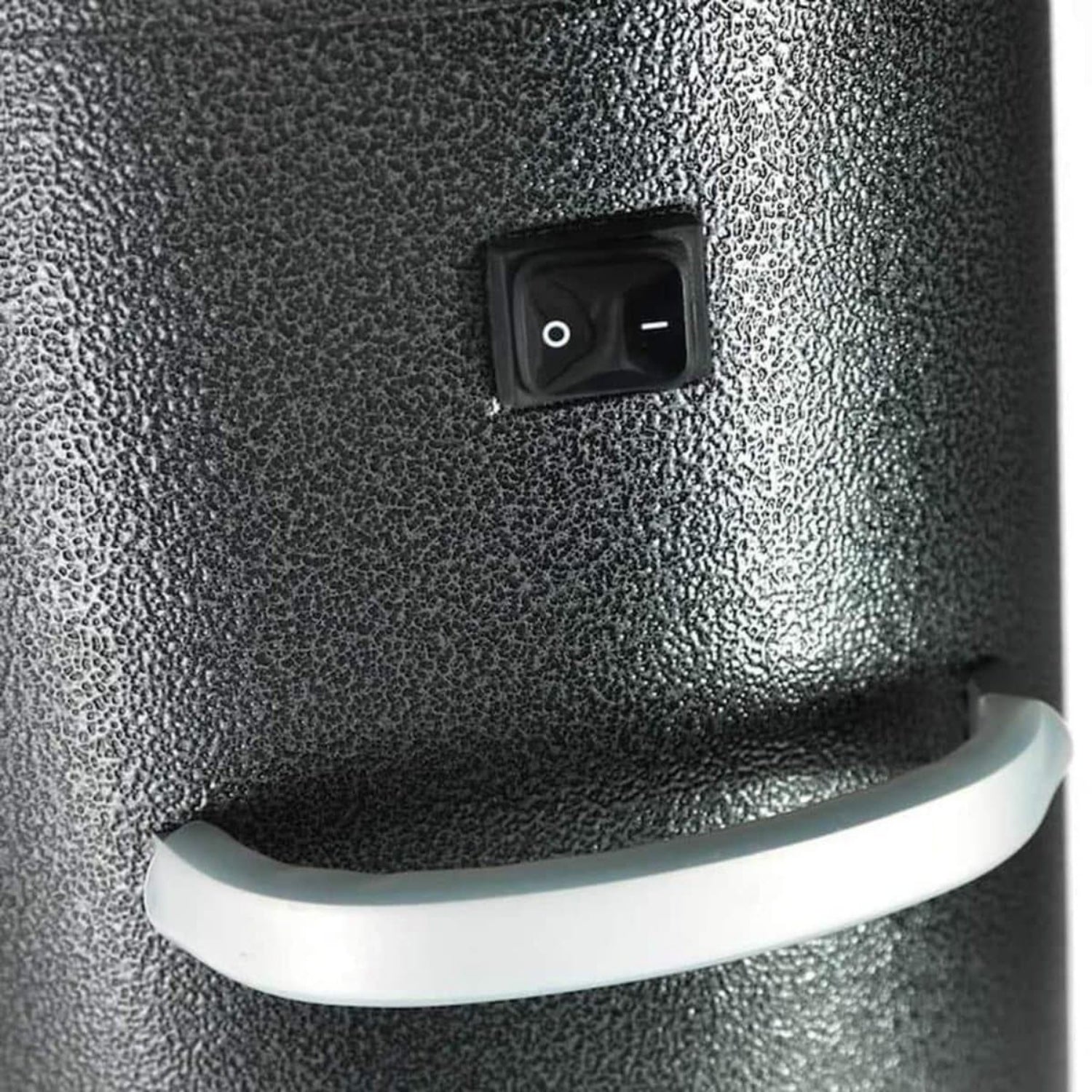 Close-up of a textured gray surface with a power switch and white handle. - Aussie Meat Infrared Electric Heater Includes Cover & Delivery (Pre-Order 7 Days)