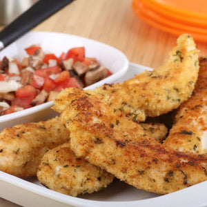 Breaded chicken tenders on a plate with a side of salad - Australian Hormone Free Chicken Tenderloins (400g)