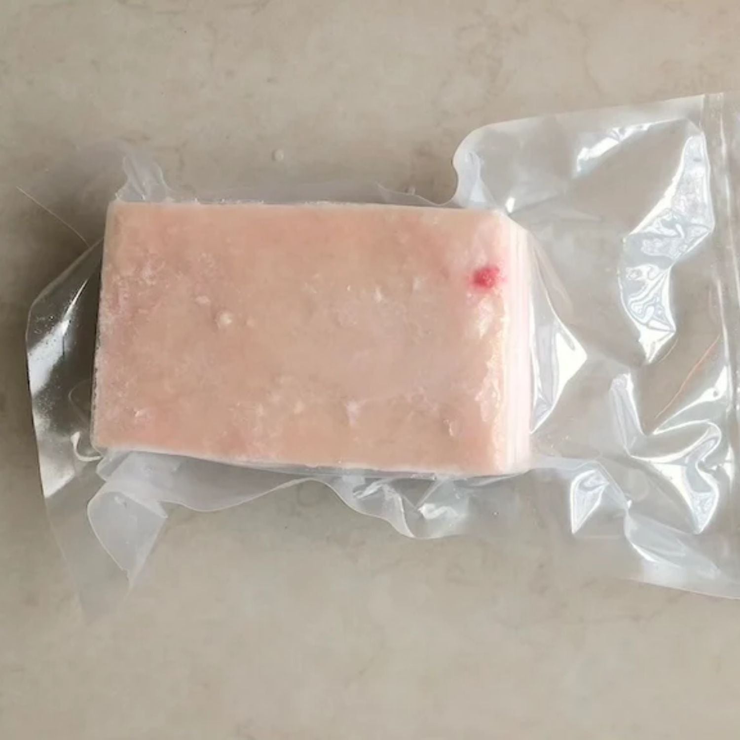 Raw pork belly in clear plastic packaging on a beige surface - EU Hormone Free Pork Belly Rind-On (1kg)